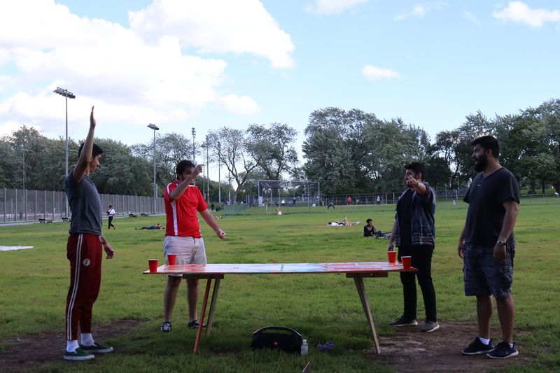 File:An outdoor beer die game.jpg