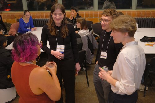 Students and professionals talking at networking event [2026]